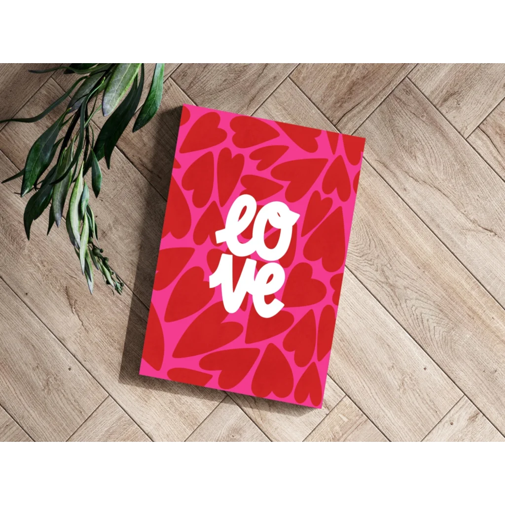 Vibrant pink insigne aluminum print with bold white love text and red hearts