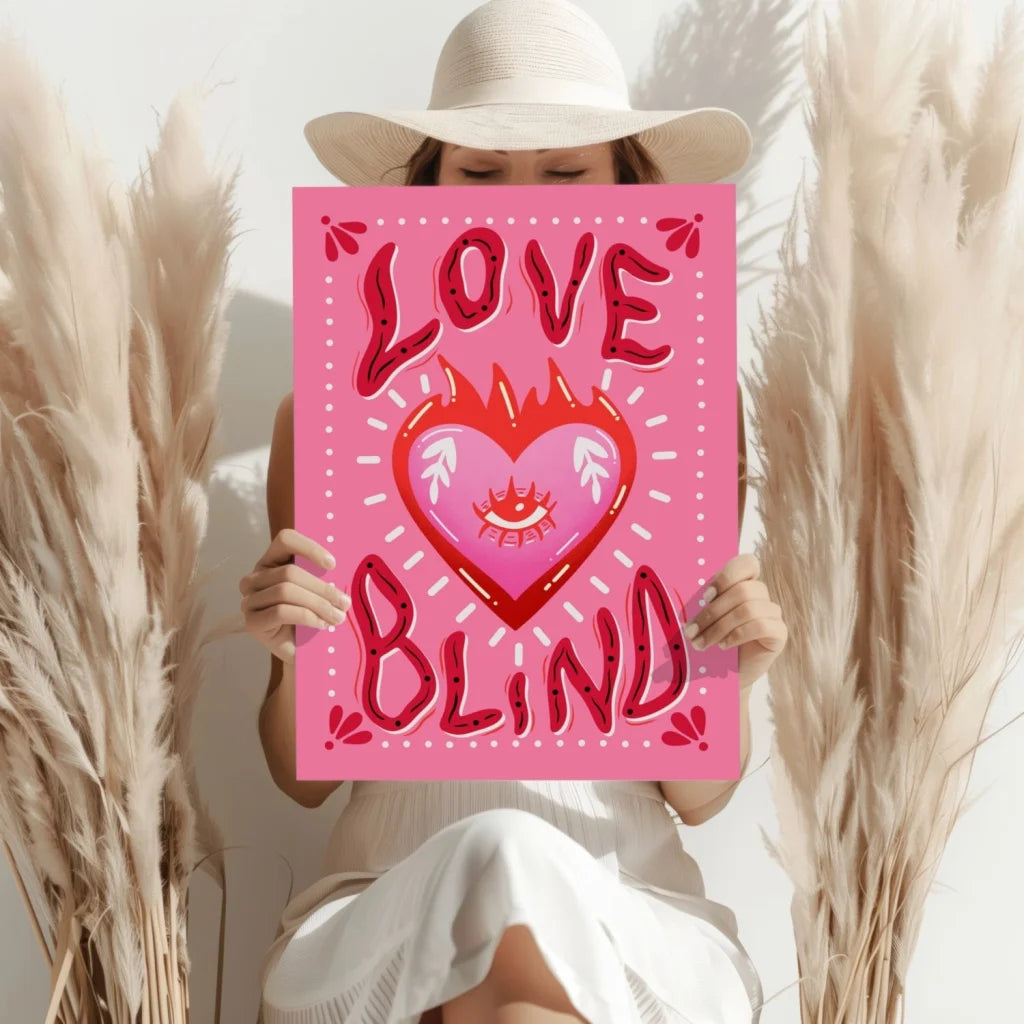 Pink heart canvas wall art with love blind text, eye, and flame design