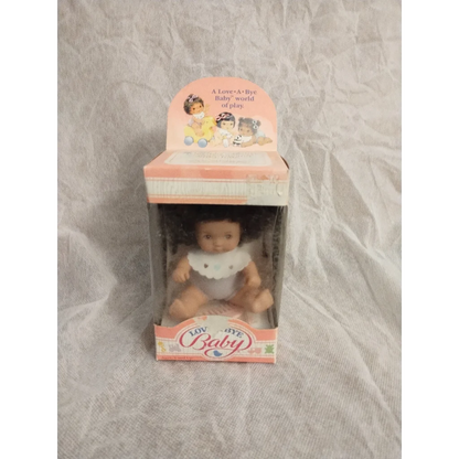 Rare 1987 Curly Brunette Baby Doll Hasbro Collectible in Pastel Packaging