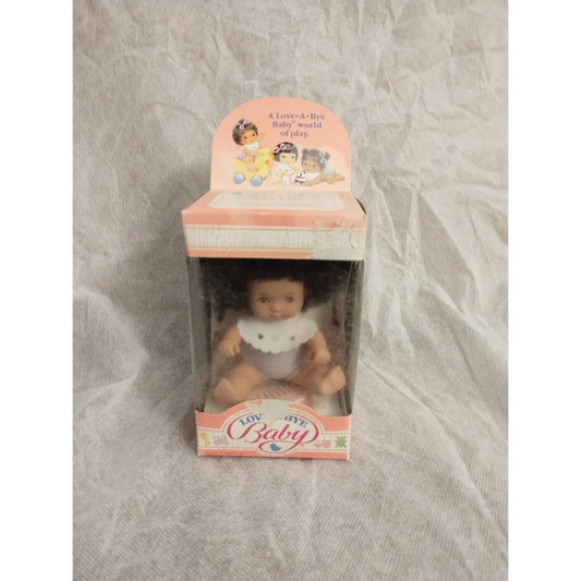 Rare 1987 Curly Brunette Baby Doll Hasbro Collectible in Pastel Packaging