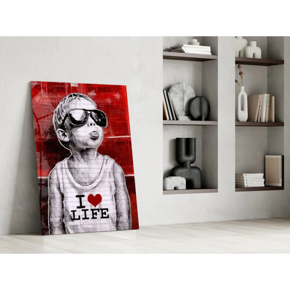 Bold red and black wall art canvas print of stylized boy in sunglasses with I love life shirt