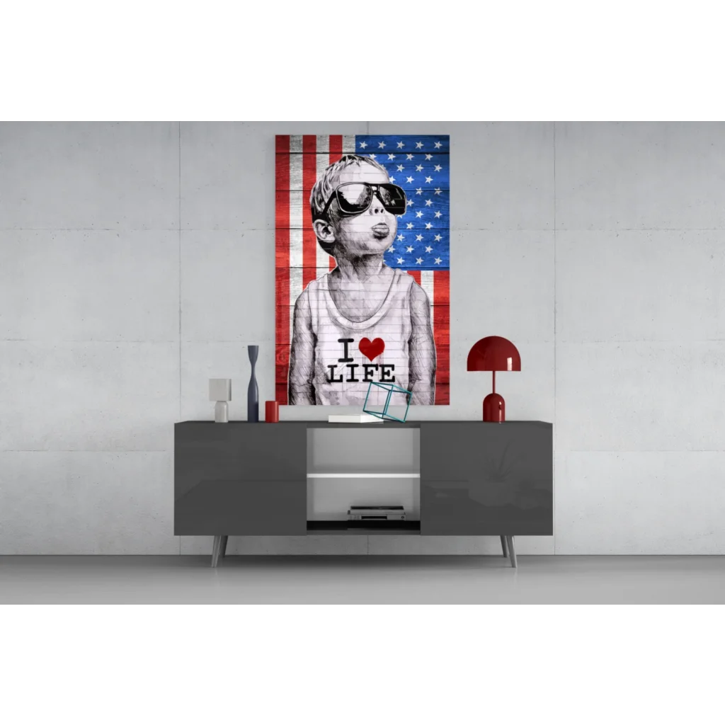 Black and white canvas wall art of boy in sunglasses with I love life text on American flag backdrop