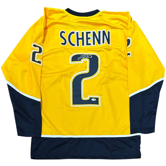 Luke Schenn autographed custom hockey jersey in gold with navy blue and yellow accents