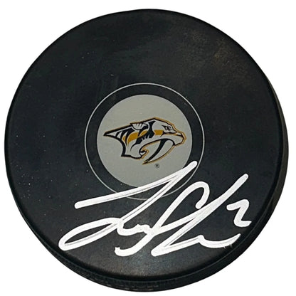 Luke Schenn autographed Nashville Predators hockey puck with JSA