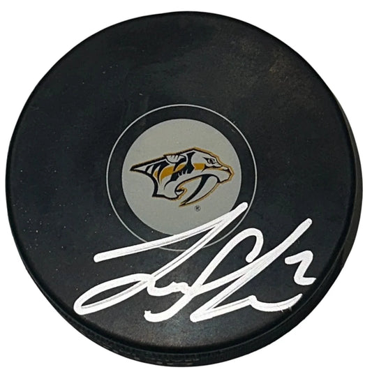 Luke Schenn autographed Nashville Predators hockey puck with JSA