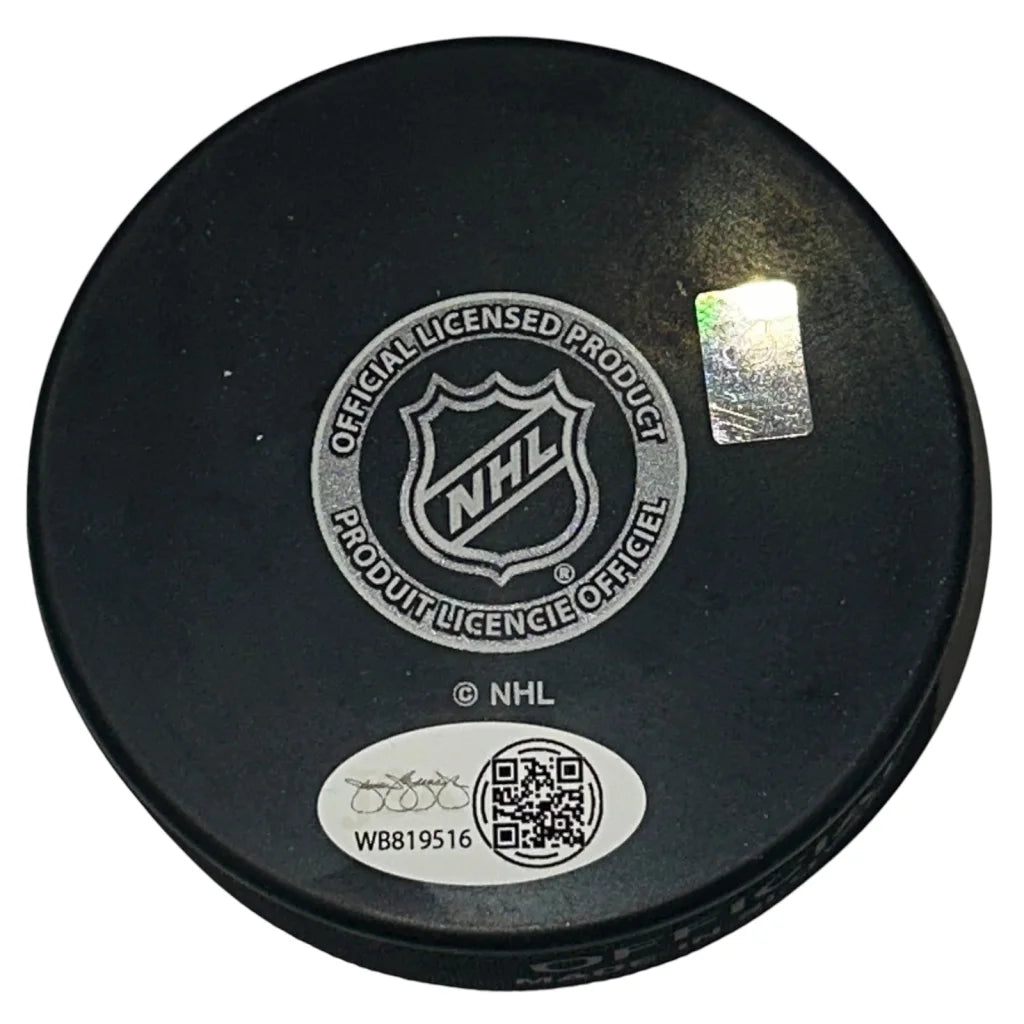 Luke Schenn autographed Nashville Predators hockey puck with JSA