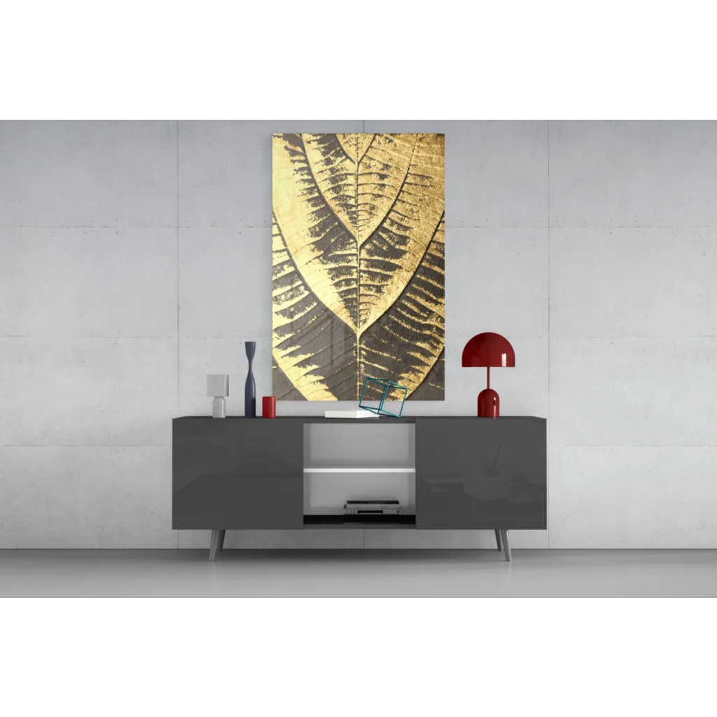 Luxe Gold Leaf wall art with shimmering metallic texture on glass wall