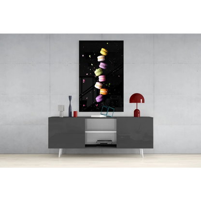 Vibrant floating macarons glass wall art print on black canvas