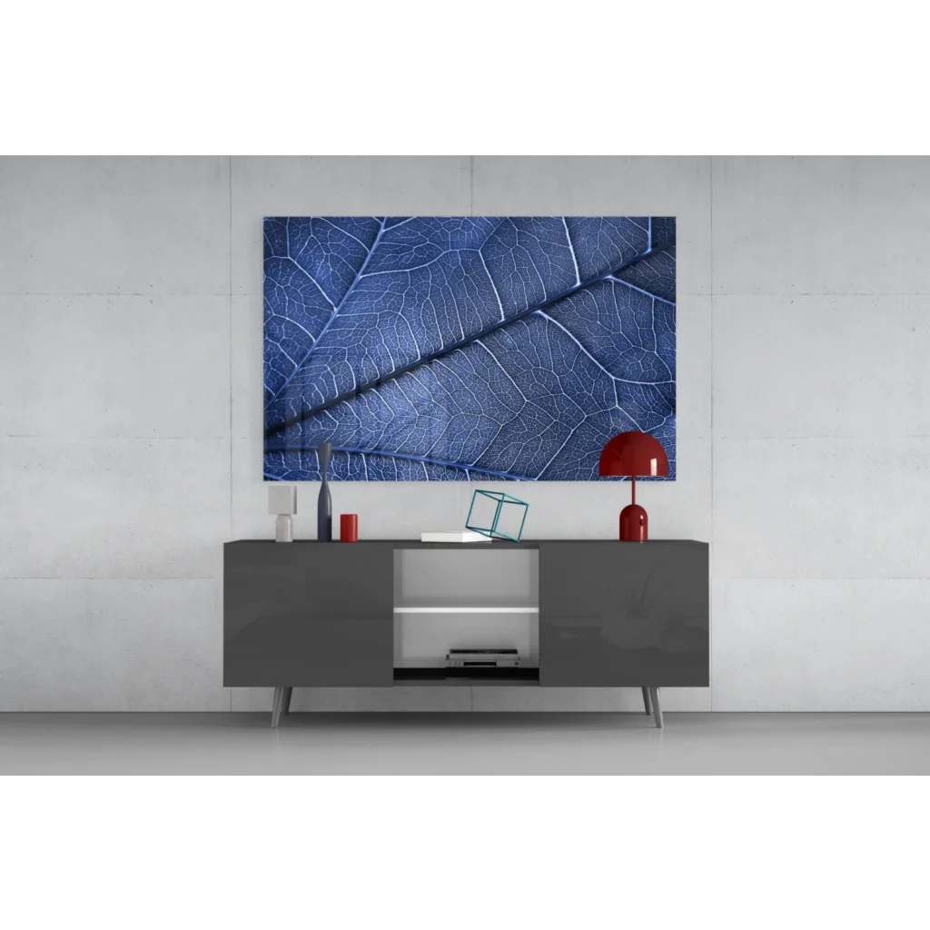 Stunning blue leaf wall art canvas with white vein details in modern setting