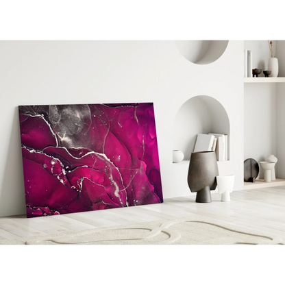 Vibrant magenta glass wall art with black accents and white marble-like design