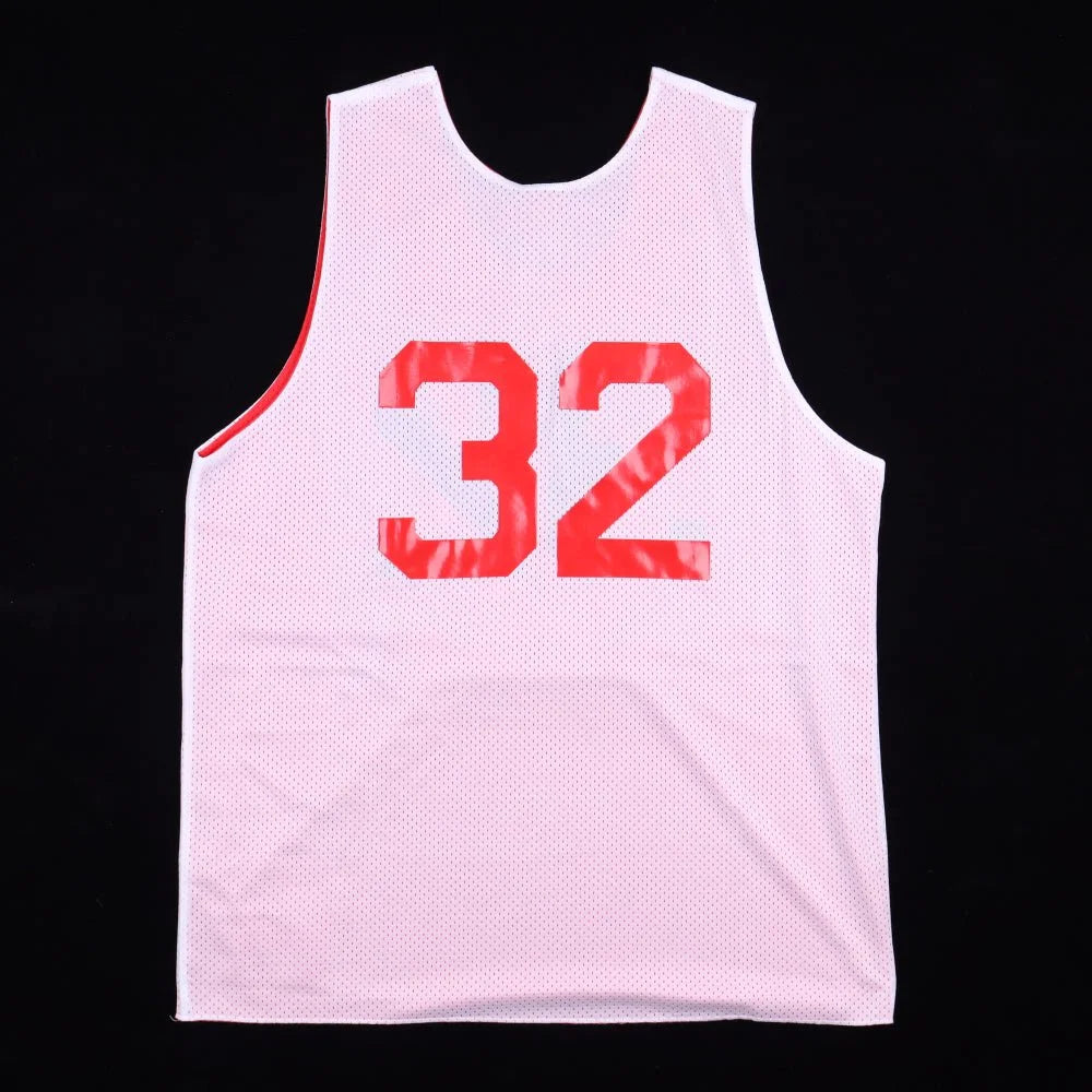 White mesh reversible sports jersey with red trim and number 32, Magic Johnson signed