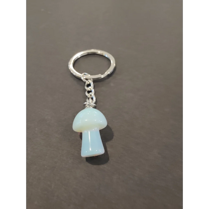 Delicate light blue stone mushroom keychain with silver chain