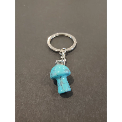 Vibrant turquoise stone mushroom keychain with silver ring and chain