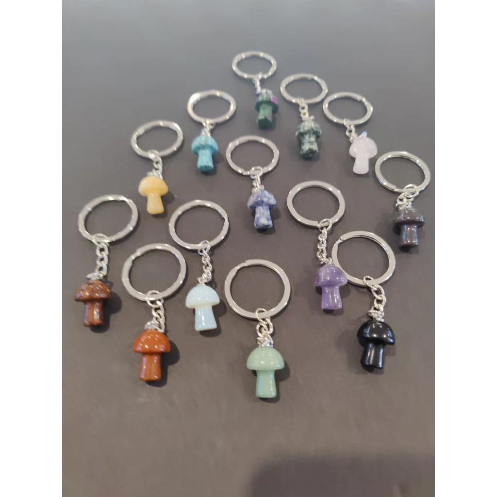 Vibrant stone mushroom keychain collection with colorful polished designs