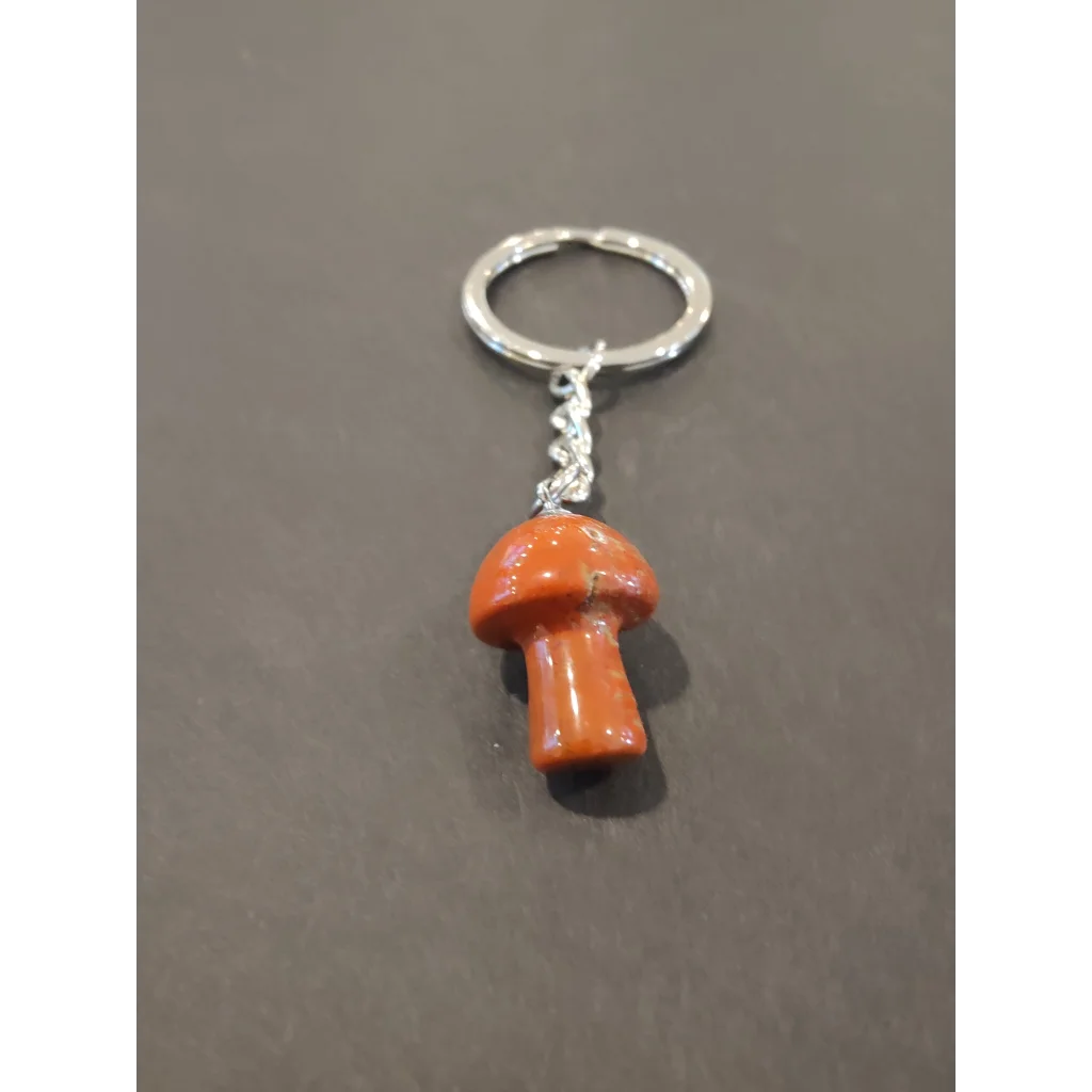 Vibrant orange stone mushroom keychain with silver ring and chain