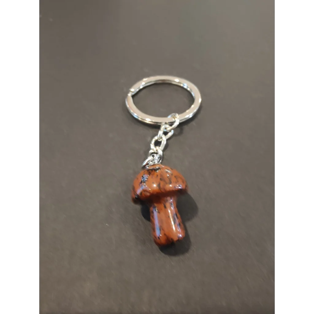 Polished reddish-brown stone mushroom keychain with silver ring and chain
