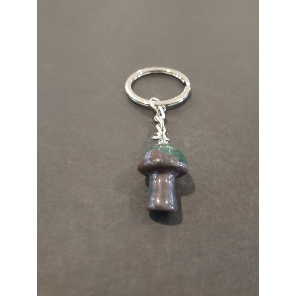Vibrant glossy stone mushroom keychain with silver ring and chain