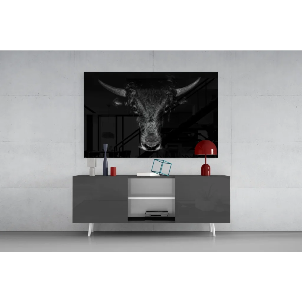 Black and white majestic bull head wall art above gray console