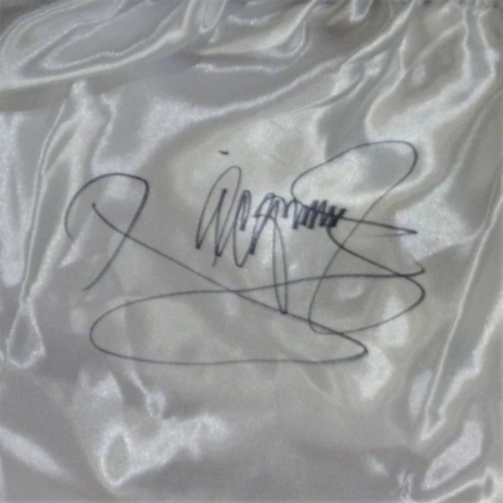 Manny Pacquiao autographed signature on Team Pacquiao boxing trunks