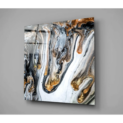 Stunning gold marble glass wall art with swirling black and white patterns