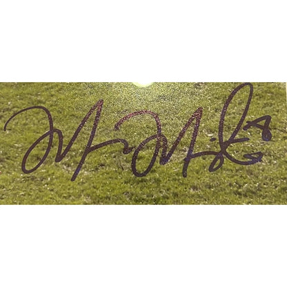 Marcus Mariota first NFL game autographed 8x10 photo with purple and black pen