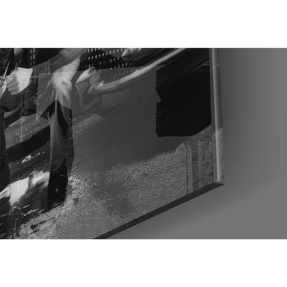 Black-and-white Elvis Presley wall art print of man in wet pavement scene