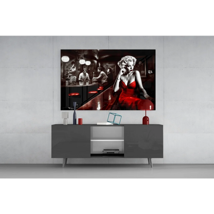 Sleek 4K QLED TV with black frame and silver legs on Marilyn Monroe red dress glass wall art