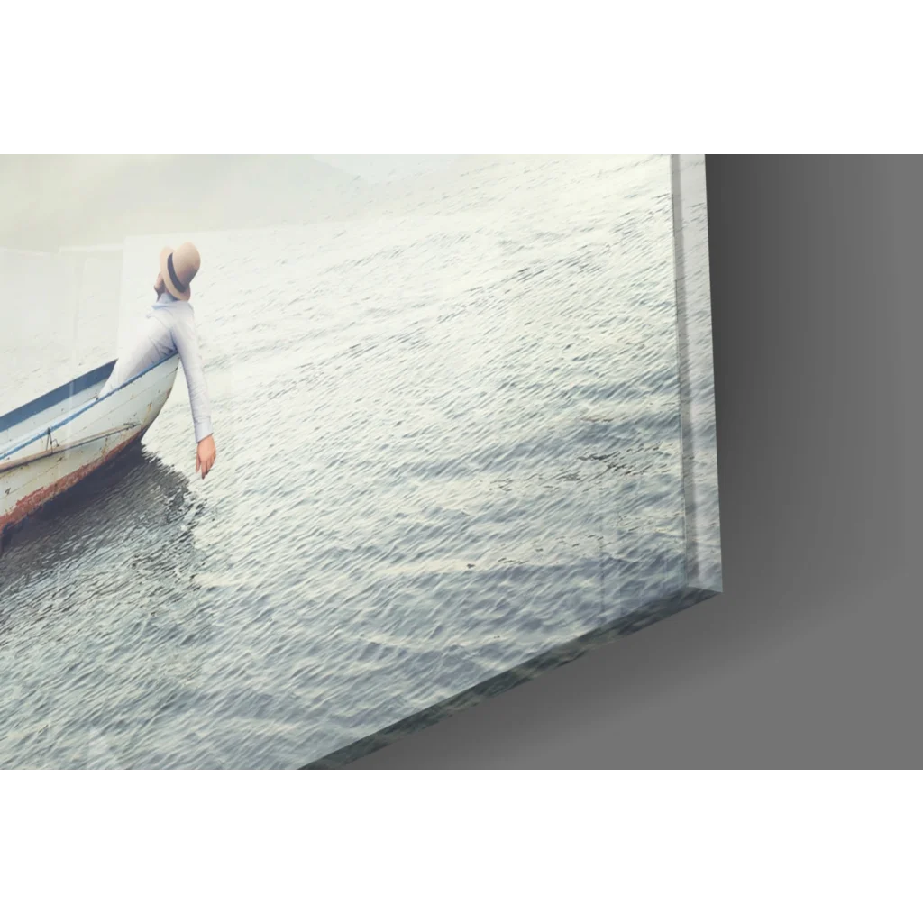Serene woman on boat in glass wall art canvas print