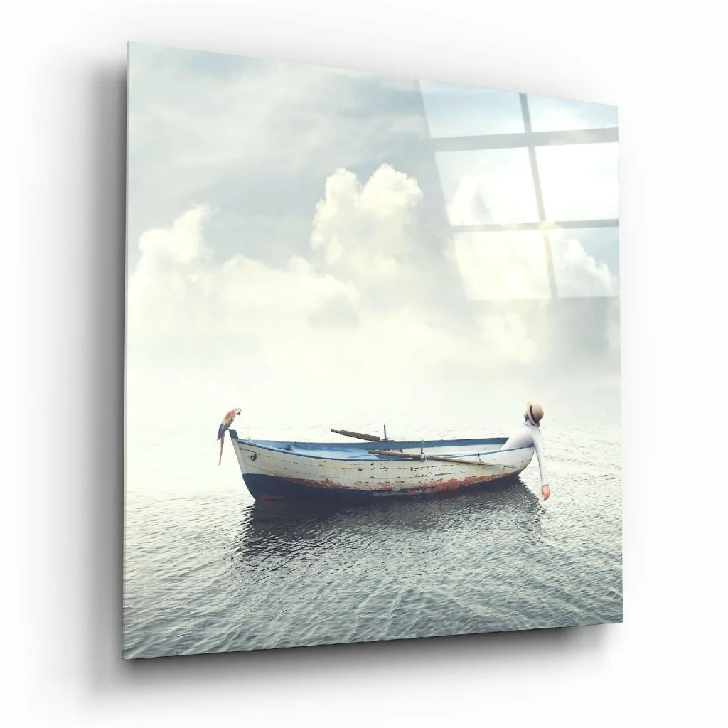 Serene weathered white and blue rowboat glass wall art on calm water