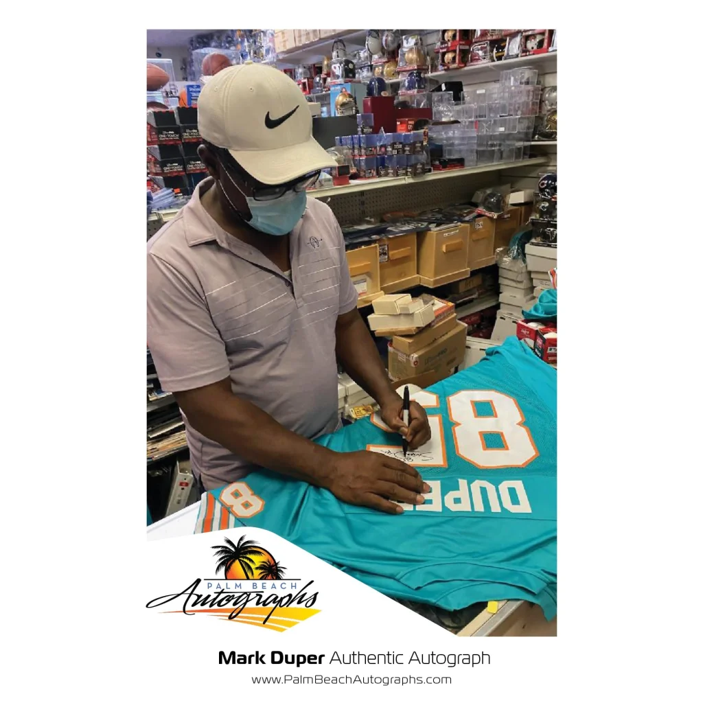 Back of Mark Duper autographed Miami Dolphins teal jersey #85 JSA