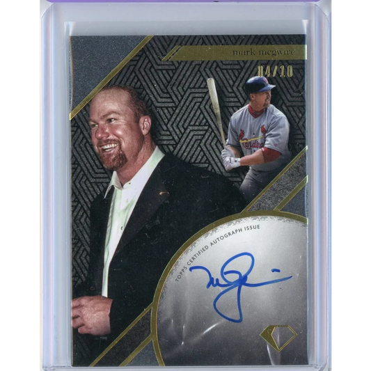 Autographed Mark McGwire baseball card in PSA graded collectible display