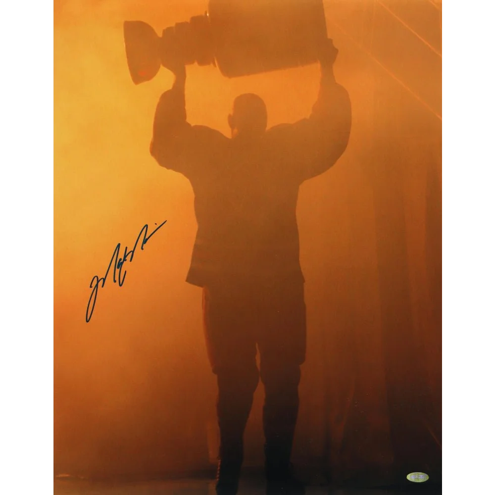 Autographed Mark Messier silhouette photo holding a trophy with Beckett COA