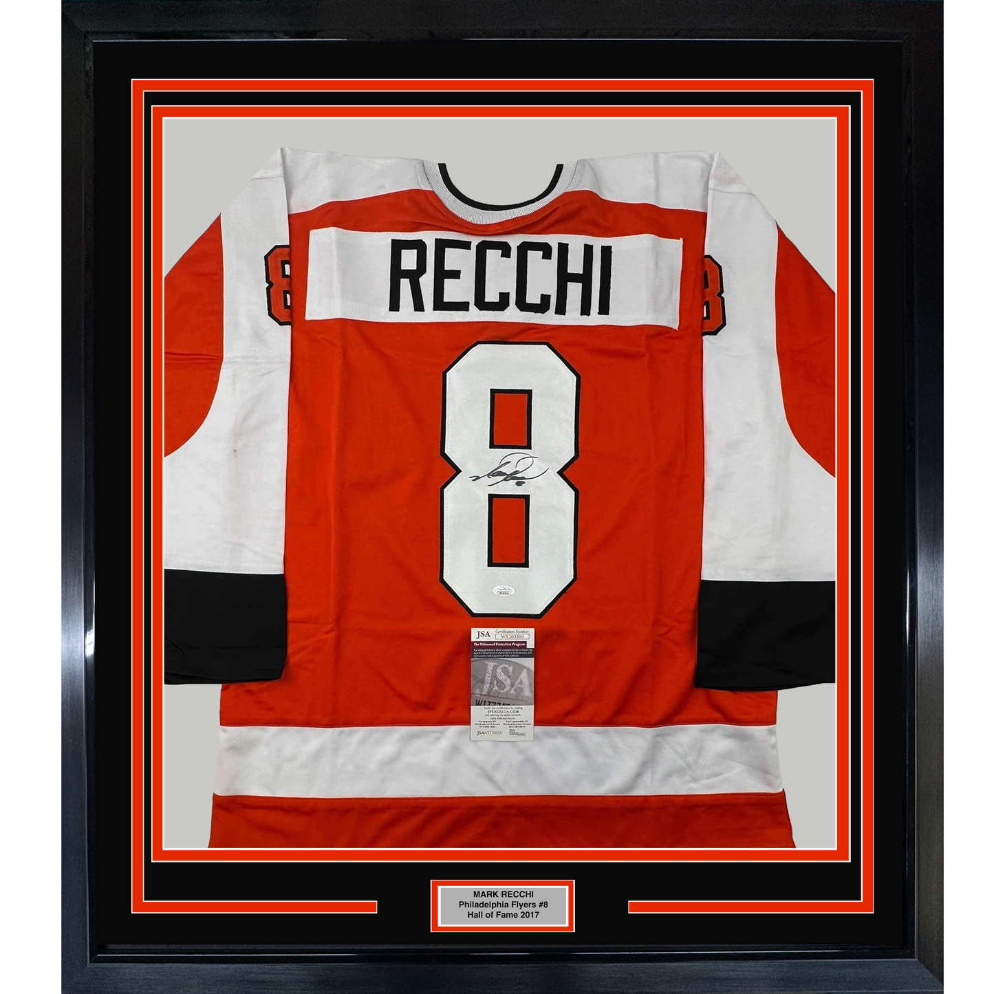 Framed red and white Philadelphia Flyers #8 jersey signed by Mark Recchi, displayed flat with authentication certificate visible.