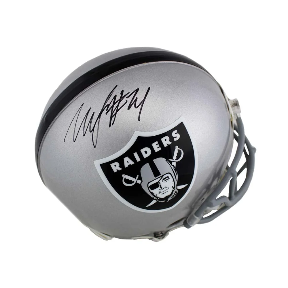 Marshawn lynch autographed silver and black oakland raiders proline mini helmet with signature on the side