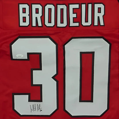 Martin Brodeur autographed red jersey with number 30 and Brodeur name