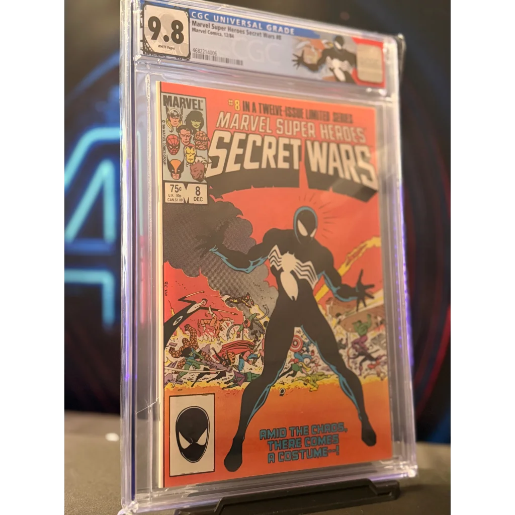 Marvel super heroes secret wars #8 comic book in 9.8 cgc slab featuring black-and-white spider-man silhouette on orange