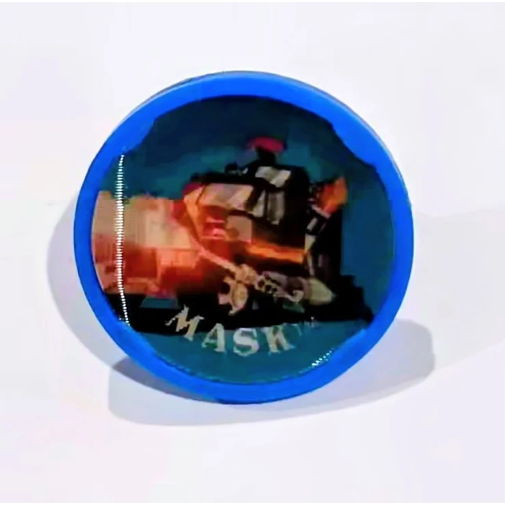 Blue mask lenticular ring in bold circular case with black white design