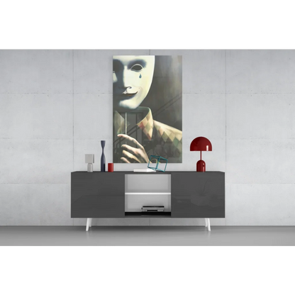 Striking black-and-white masked figure with tear wall art print above gray console