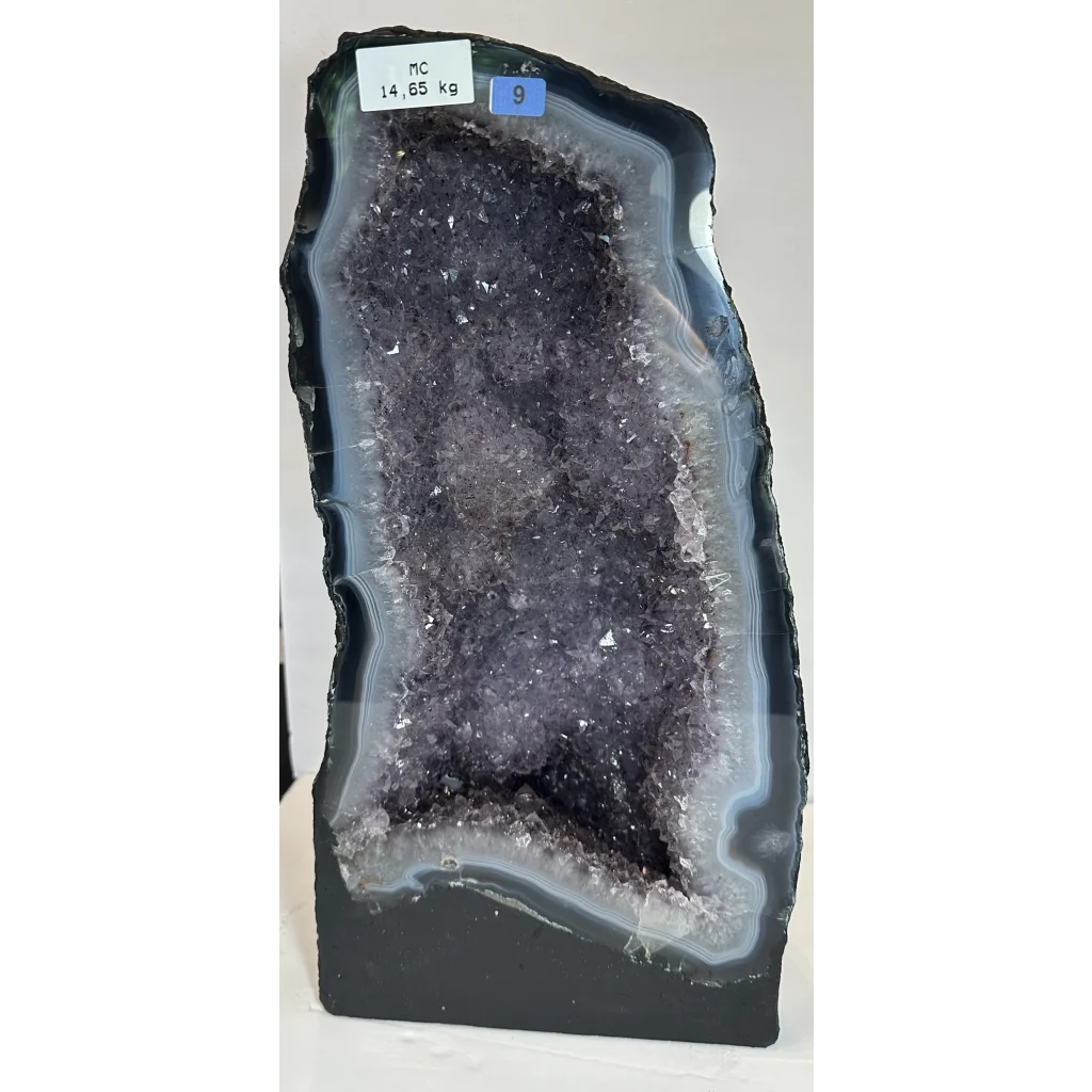 Stunning massive Brazilian amethyst cathedral geode with sparkling purple crystals