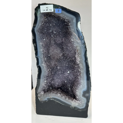 Stunning massive Brazilian amethyst cathedral geode with sparkling purple crystals