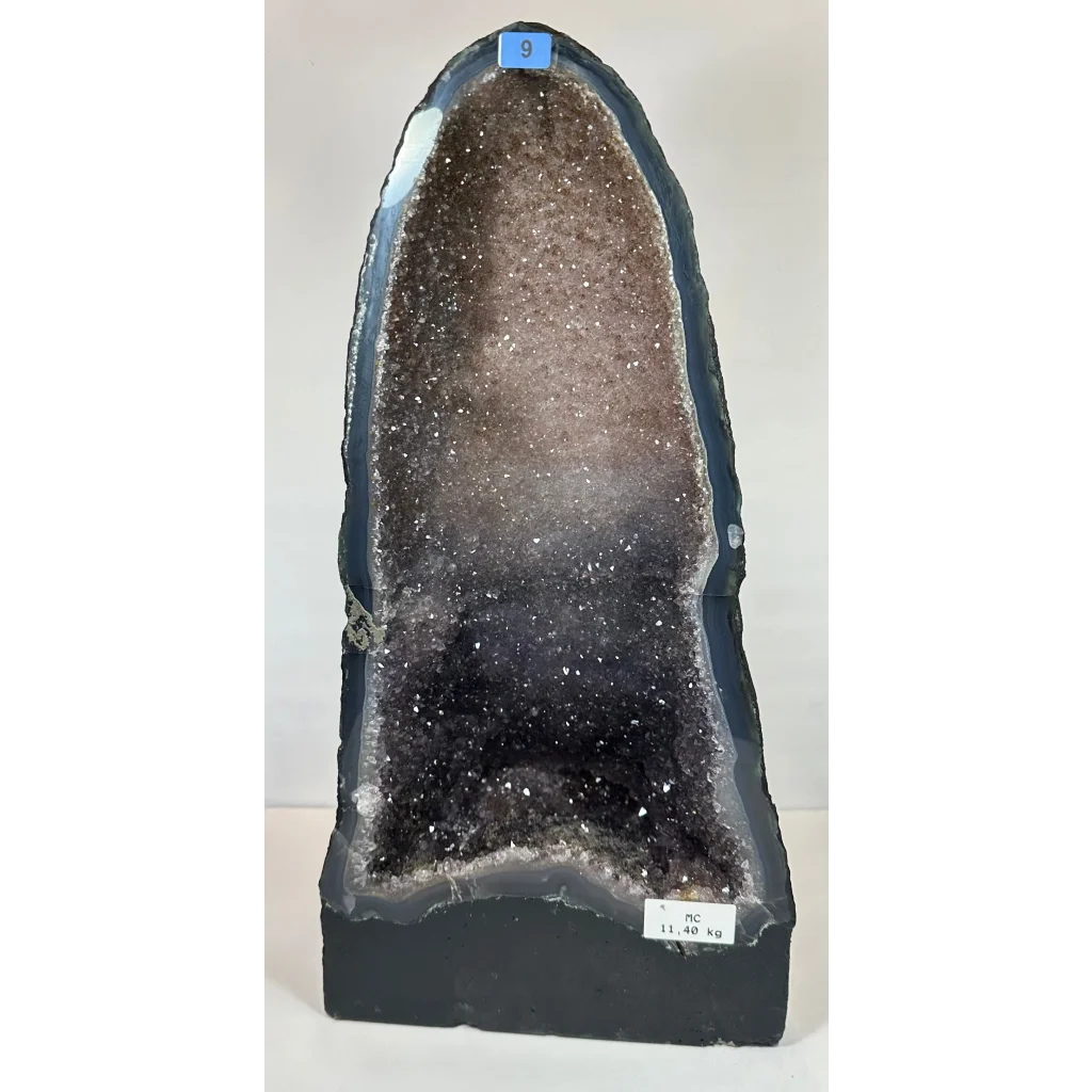 Stunning black and brown amethyst cathedral geode with sparkling quartz crystals