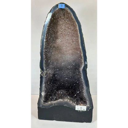 Stunning black and brown amethyst cathedral geode with sparkling quartz crystals