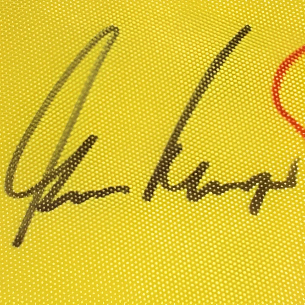 Autographed Masters golf pin flag #18 with black ink signatures on yellow fabric