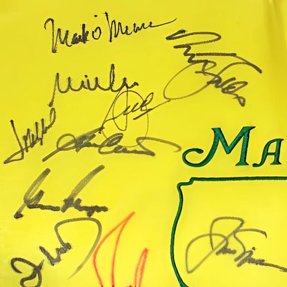 Autographed Masters golf pin flag #17 on yellow t-shirt by 23 champions