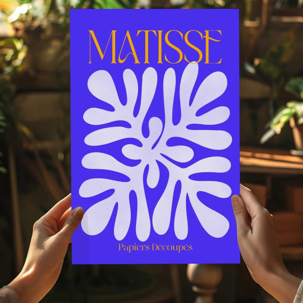 Vibrant blue Matisse art print with white cut-paper floral design and gold lettering