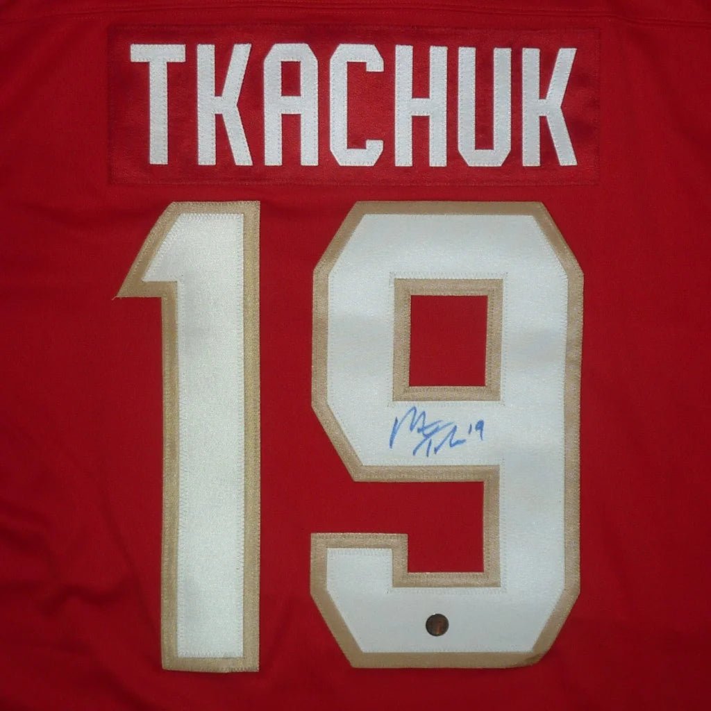 Red Florida Panthers jersey autographed by Matthew Tkachuk, number 19