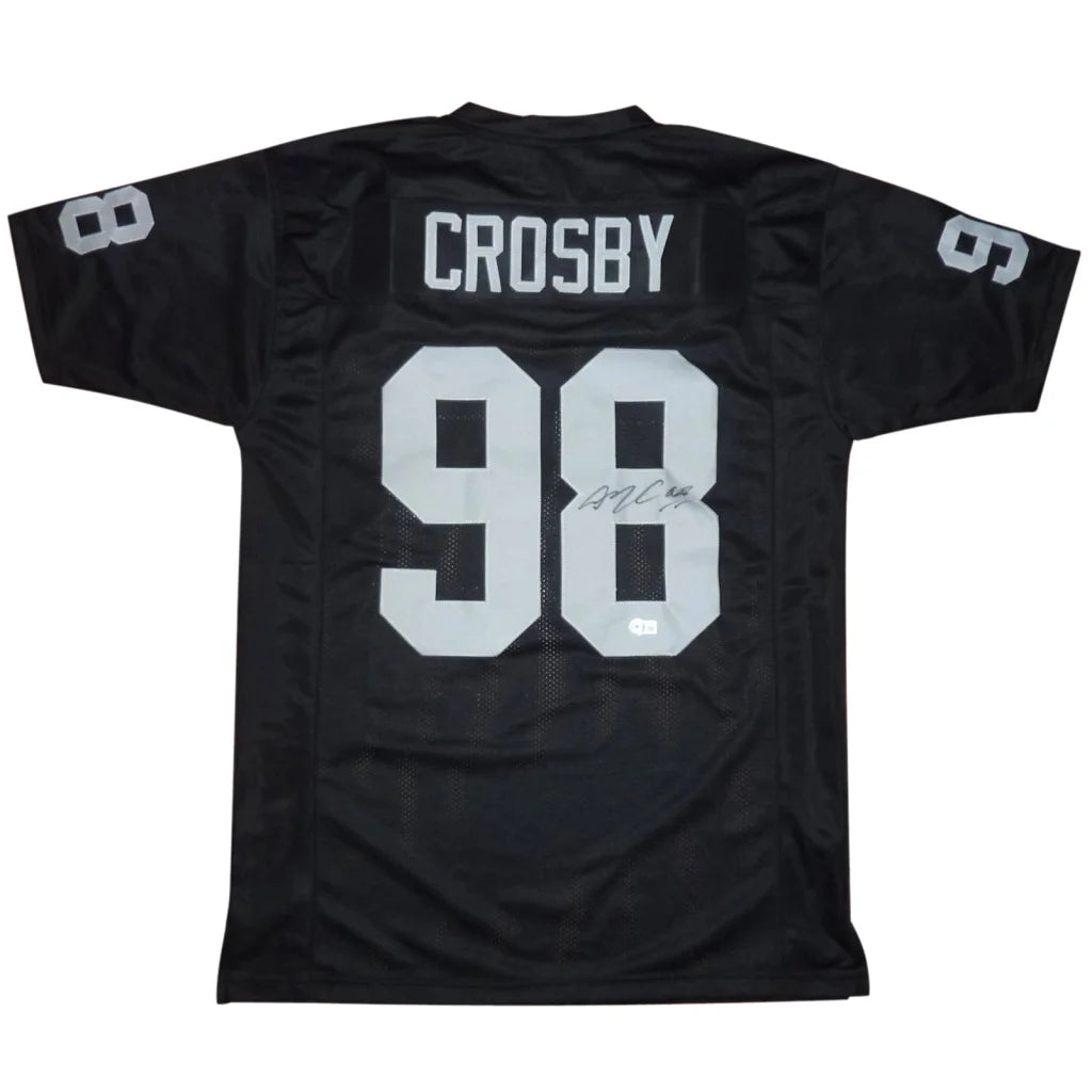 Back of black maxx crosby autographed las vegas football jersey with silver crosby 98 and signature on numeral