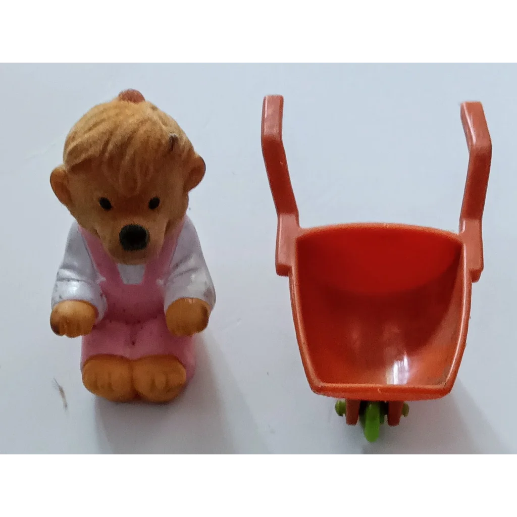 Vintage 1986 Berenstain Bears happy meal toy: teddy in pink outfit with orange cart