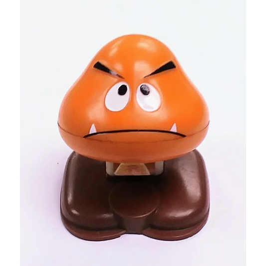 Vintage 1986 McDonalds Mario Goomba happy meal toy with orange cartoon design