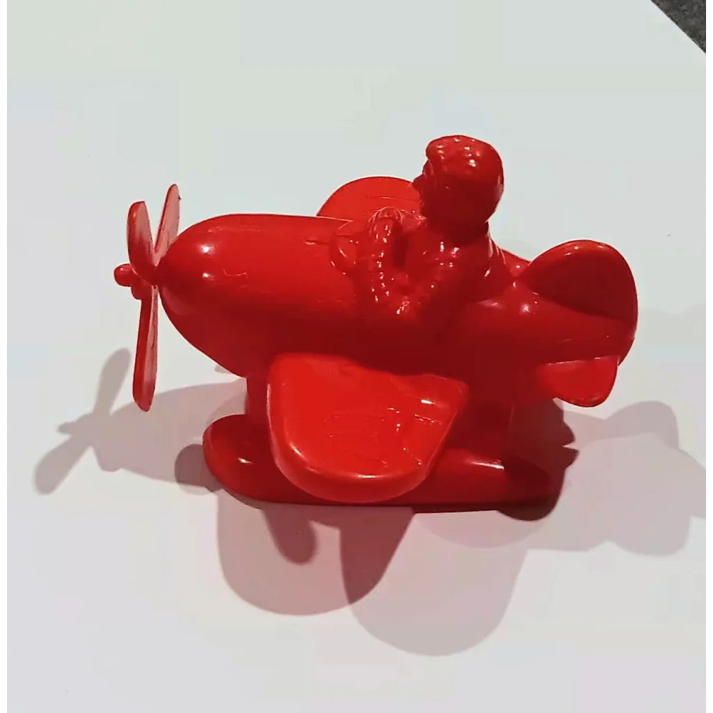 Vintage 1986 McDonald’s sea plane kids meal toy with red airplane, propeller, pilot figure, glossy finish